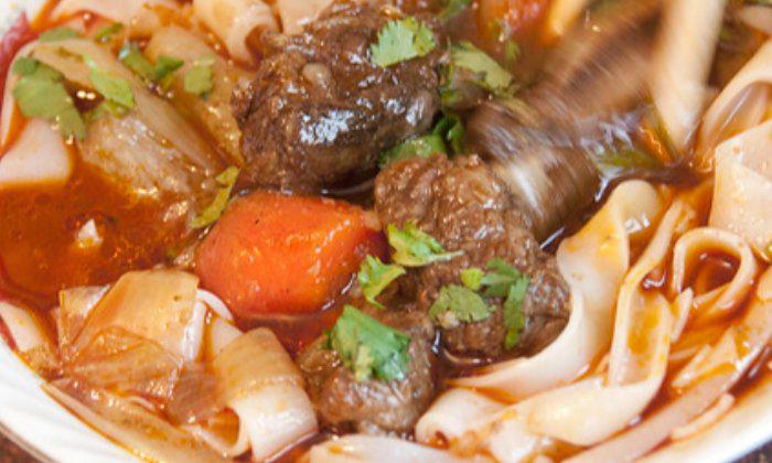 COMBIONLINE - Braised Beef over flat rice noodles